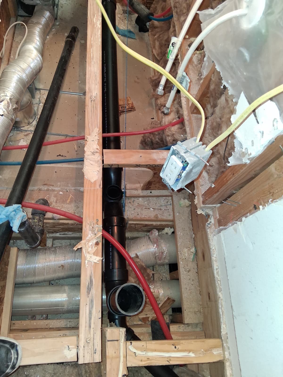 Navien tankless water heater installed in garage