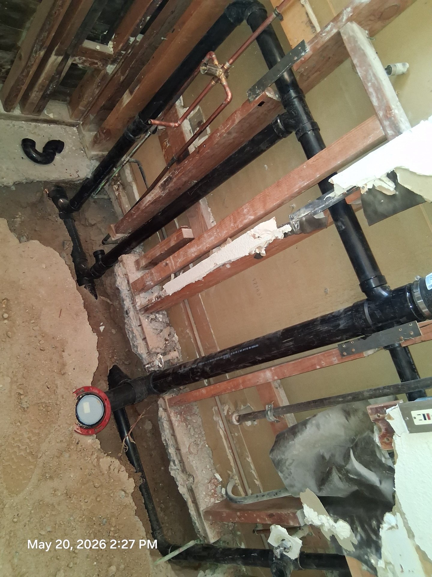 Full bathroom redrain rough-in with ABS pipe and copper in open floor